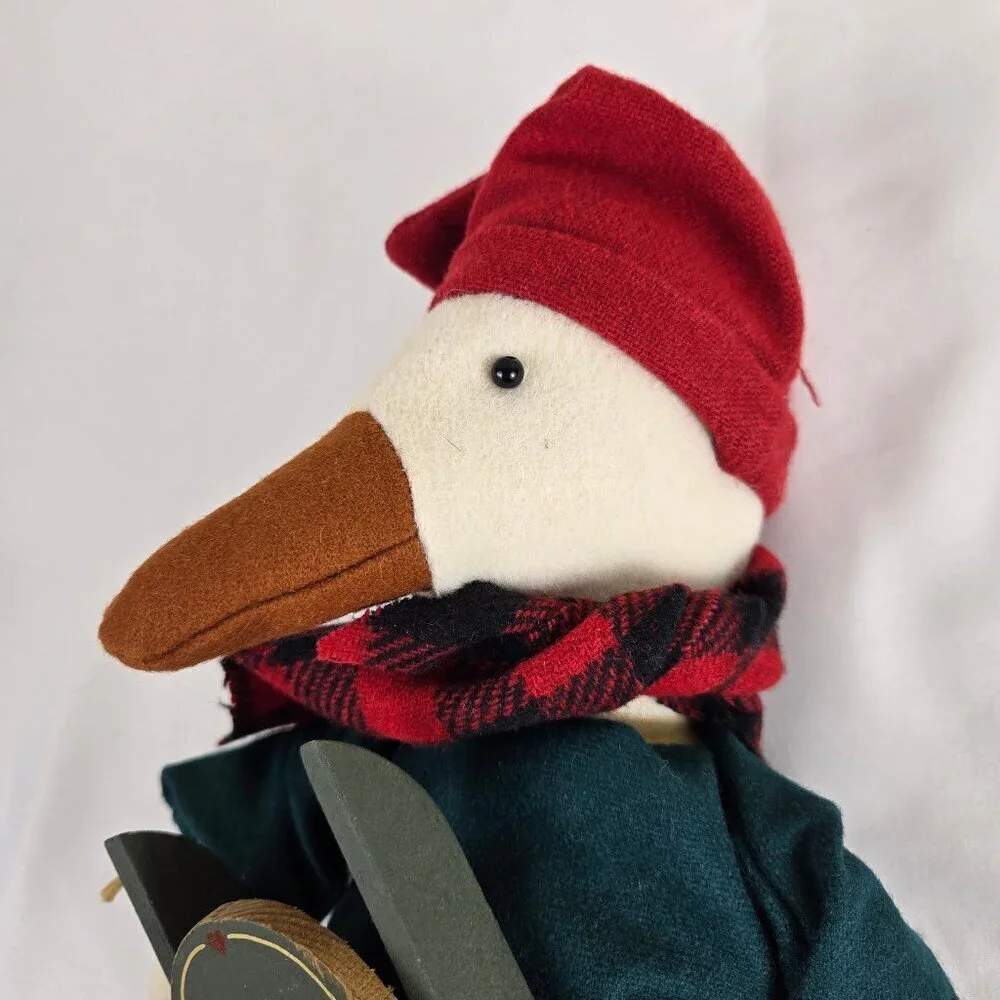 Stuffed Goose in Winter Attire Holding 